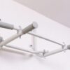 Pull up bars white atached to the wall