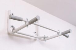 Pull up bars white atached to the wall